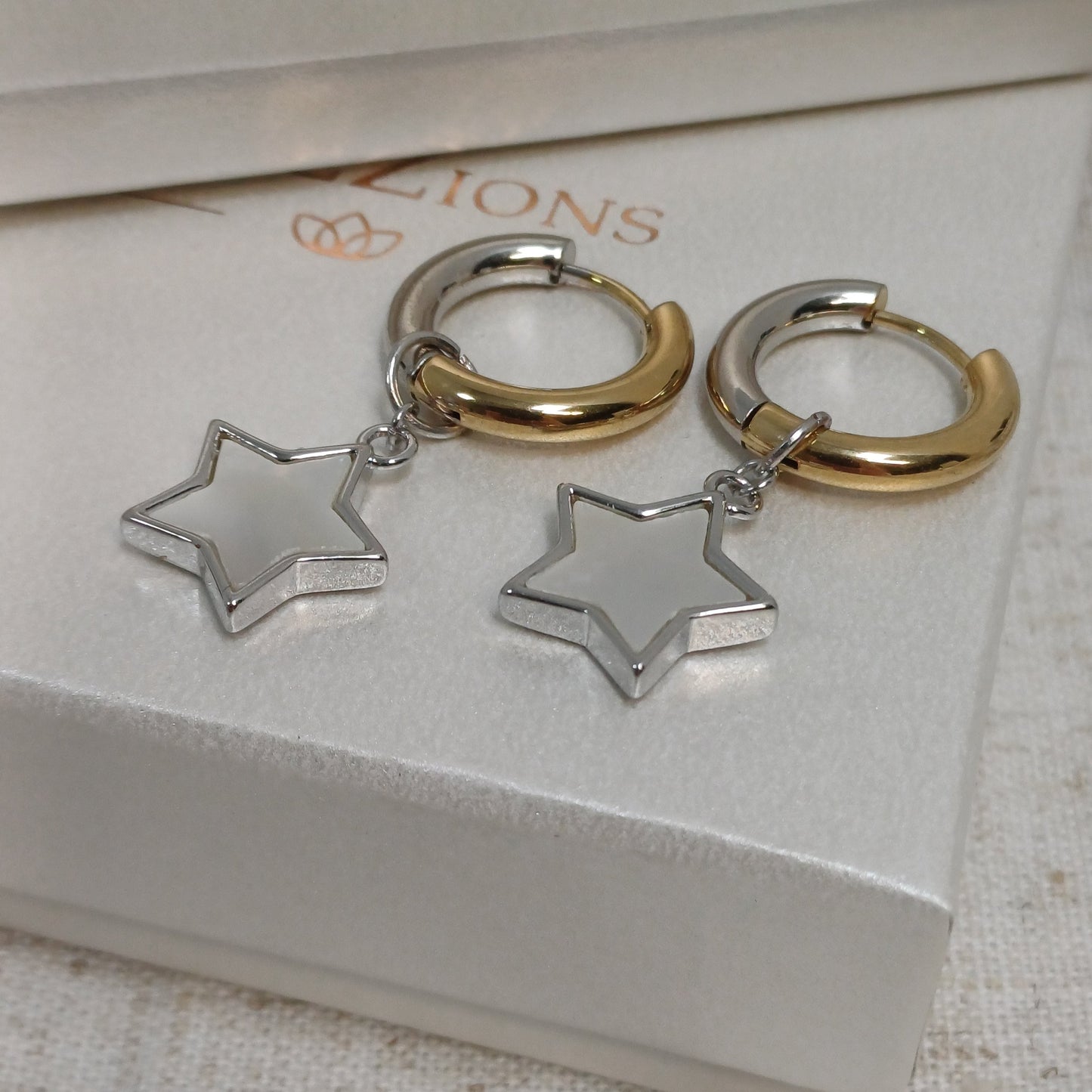 CreEZions oorbellen in zilver en goud met schelp bedel ster
