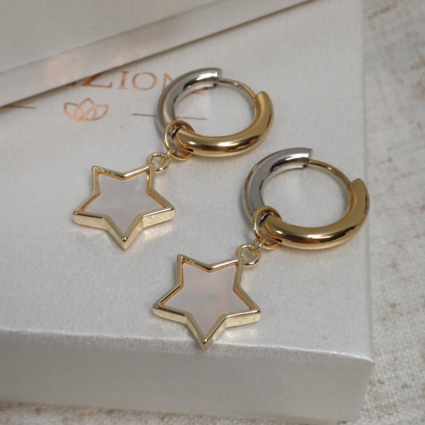 CreEZions oorbellen in zilver en goud met schelp bedel ster
