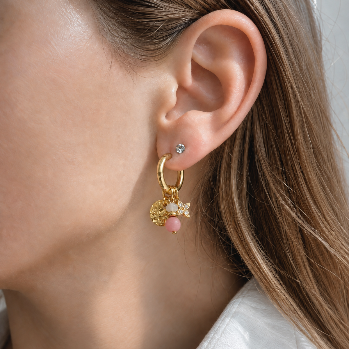 Mix & match oorbellen met roze jade, rozenkwarts en zirkonia bloem