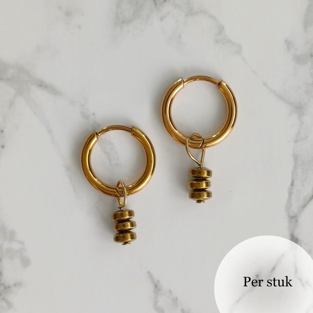 Mix & match bedel met stijlvolle hematietkraaltjes goudkleur