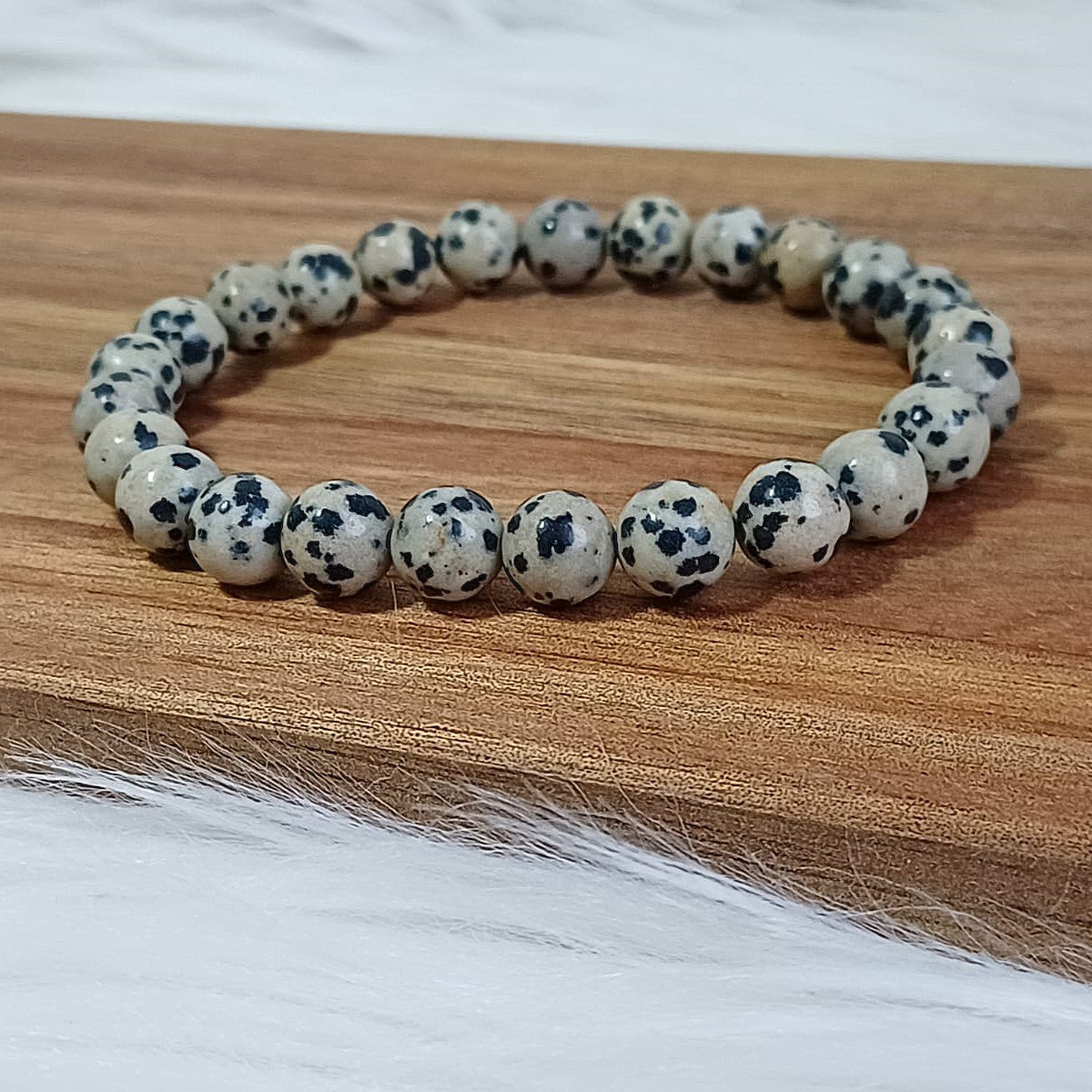 CreEZions herenarmband met zwart witte Dalmatiër Jaspis kralen