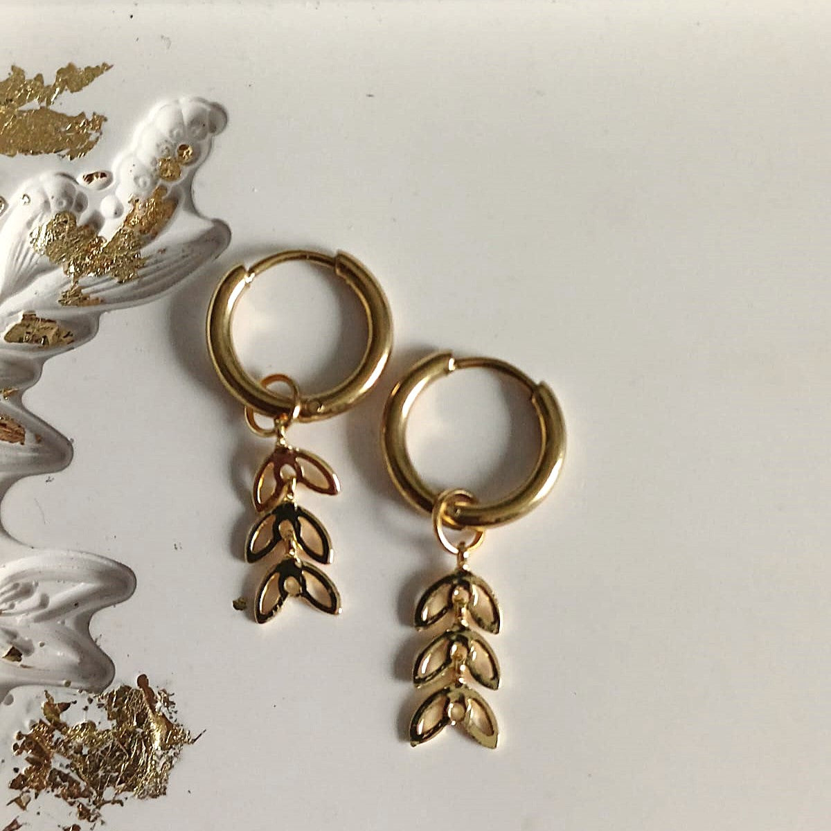 Mix & match bedel met goudkleurig bladdesign