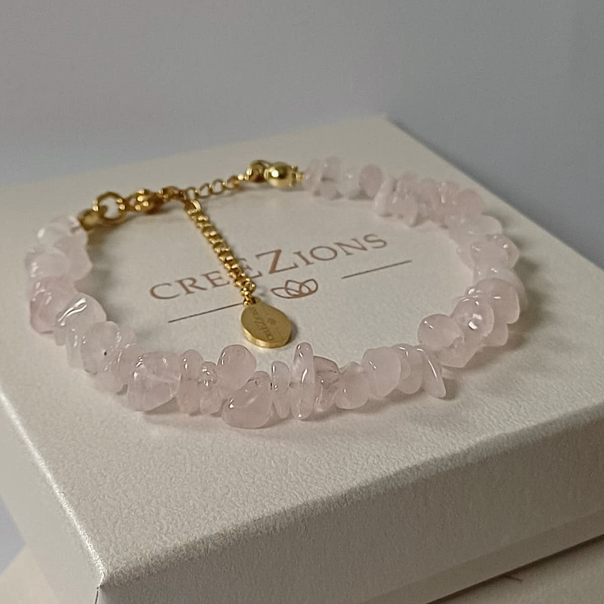 Armband met rozenkwarts chip stenen