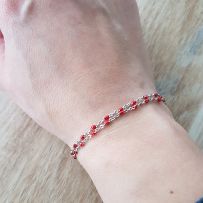 Stainless steel bracelet with red dots