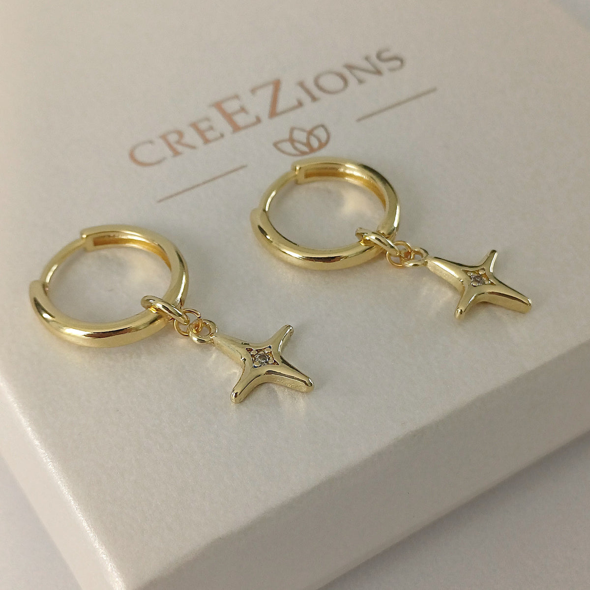 Oorbellen met noorderster en zirkonia – gold filled of 925 sterling zilver