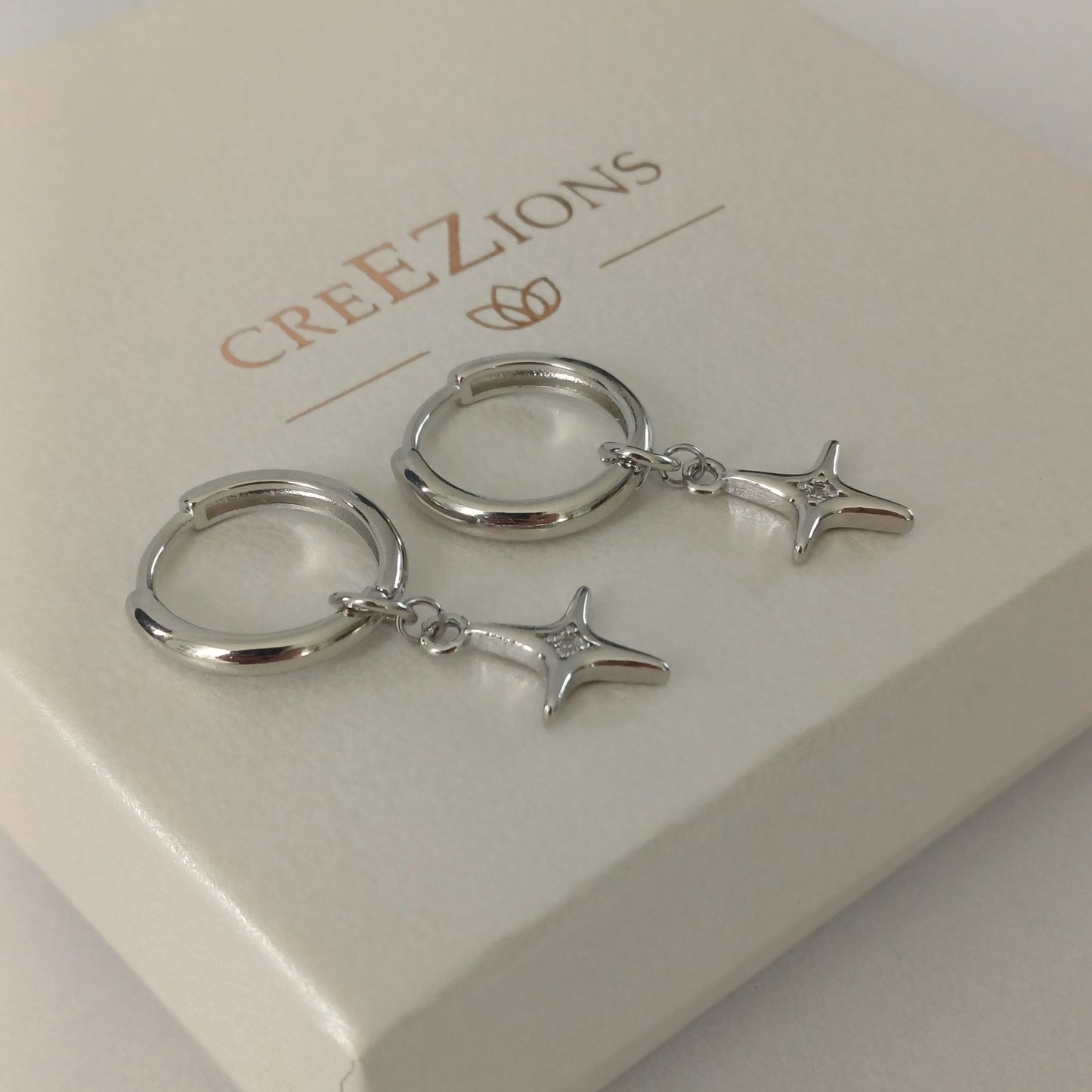 Oorbellen met noorderster en zirkonia – gold filled of 925 sterling zilver