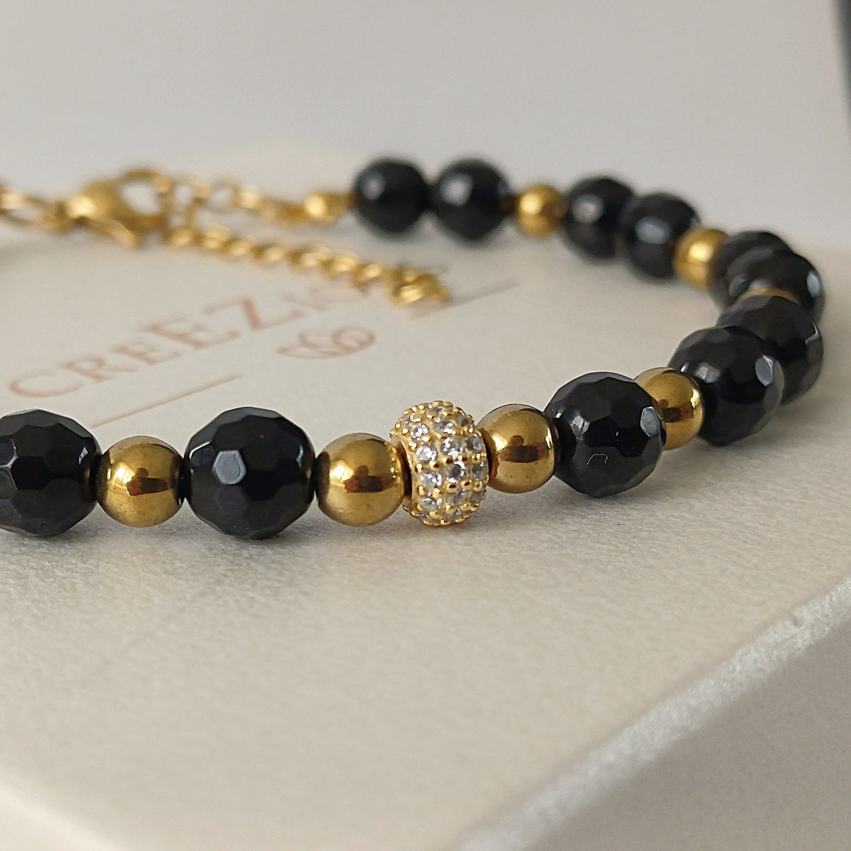 Armband met onyx, hematiet en pavé kraal