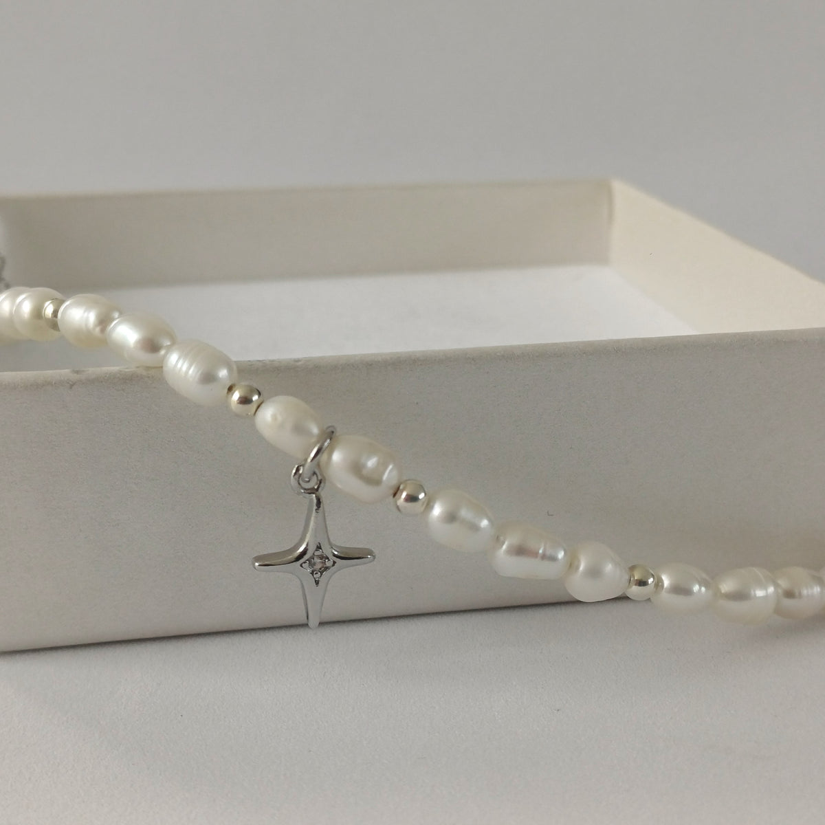 Armband met zoetwaterparels en noorderster