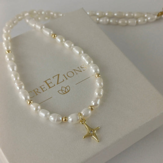 Ketting met zoetwaterparels en noorderster