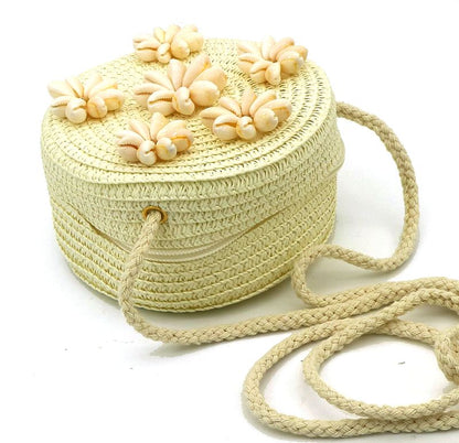 Rond kindertasje met schelpenbloemen