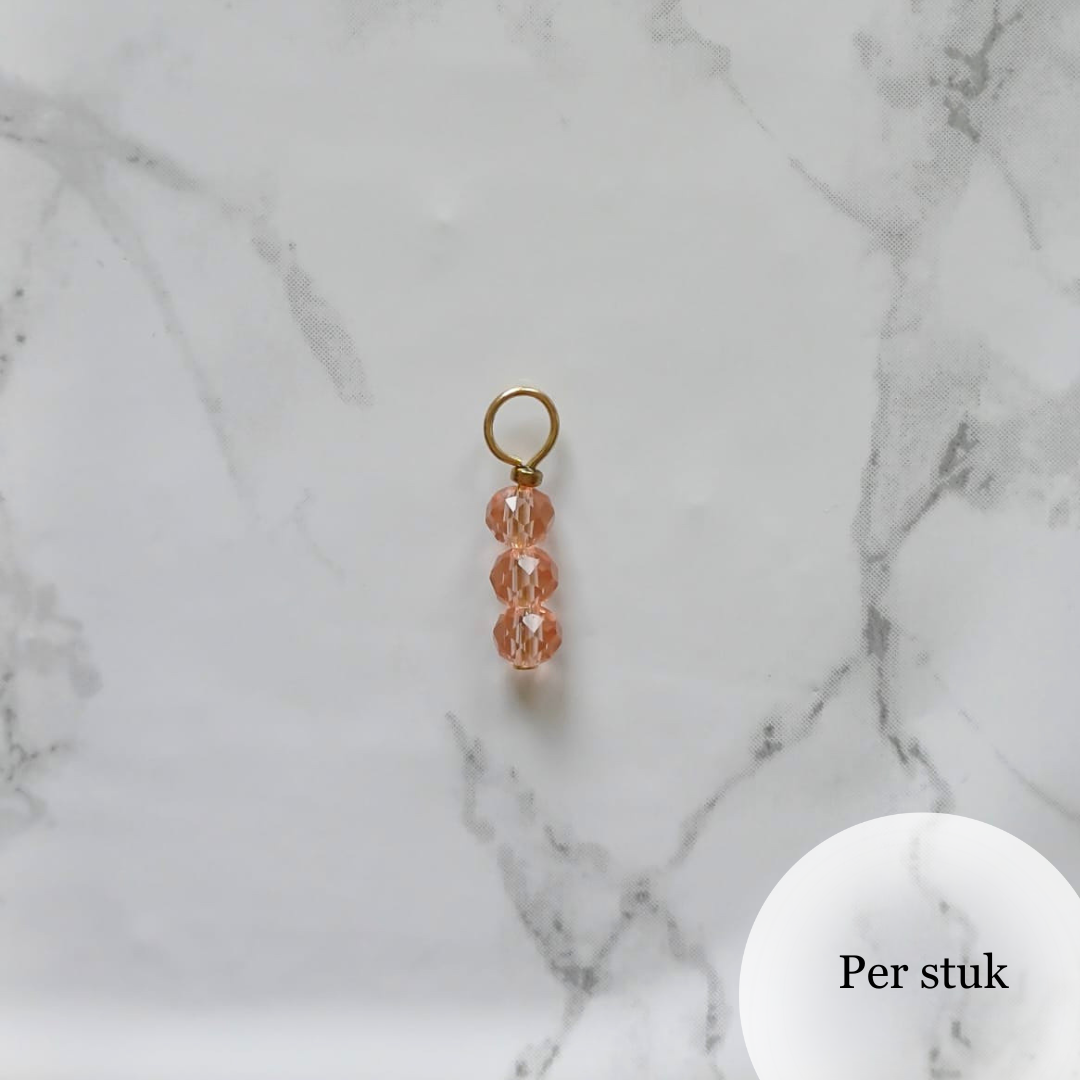 Mix & match bedel met peachy roze facetkralen goudkleur