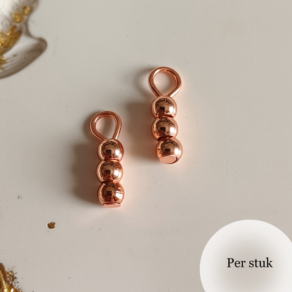 Mix & match bedels met rosé gouden RVS kralen – minimalistisch en elegant