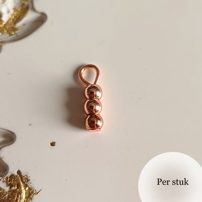 Mix & match bedels met rosé gouden RVS kralen – minimalistisch en elegant