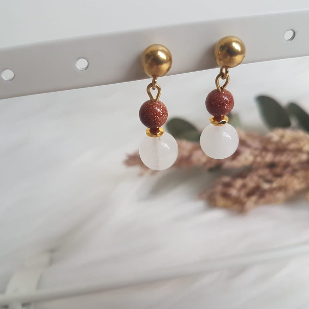 Stud earrings with Goldstone and Quartz