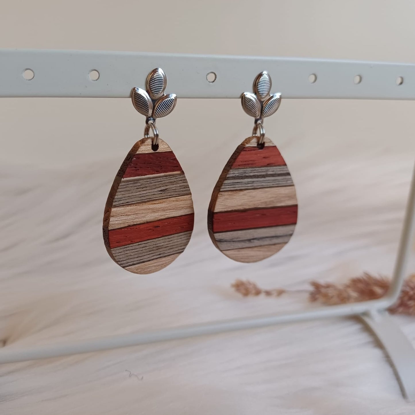 Stud earrings with red beige resin charm