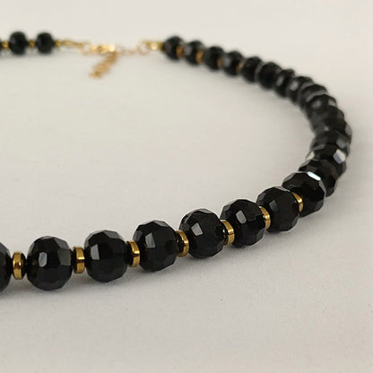Gouden halsketting met zwarte onyx