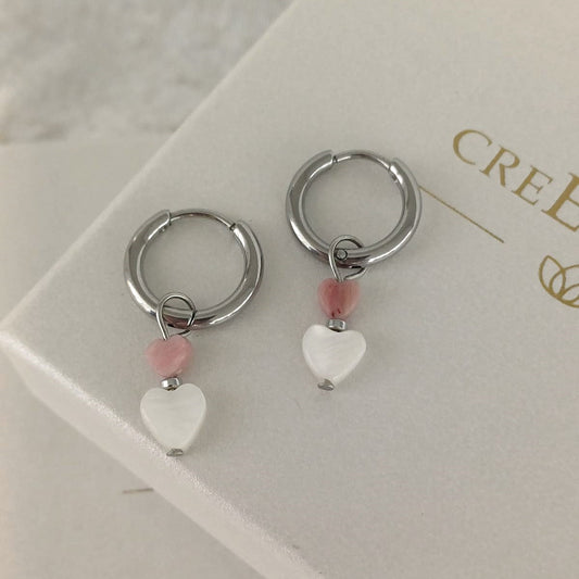 RVS oorbellen met hartjes van Rhodoniet en schelp