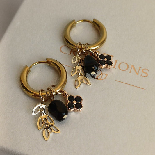 Oorbellen met zwarte bloem, obsidiaan en blaadjes