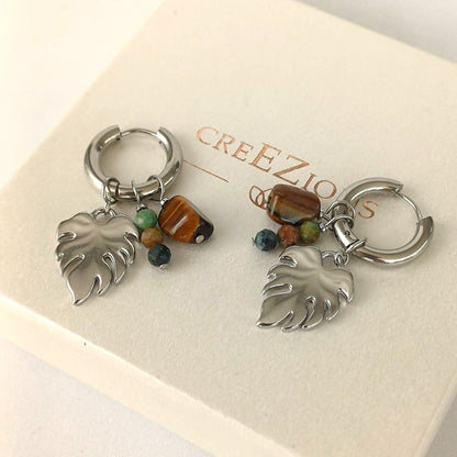 Zilverkleurige Mix & Match oorbellen met chrysocolla en tijgeroog