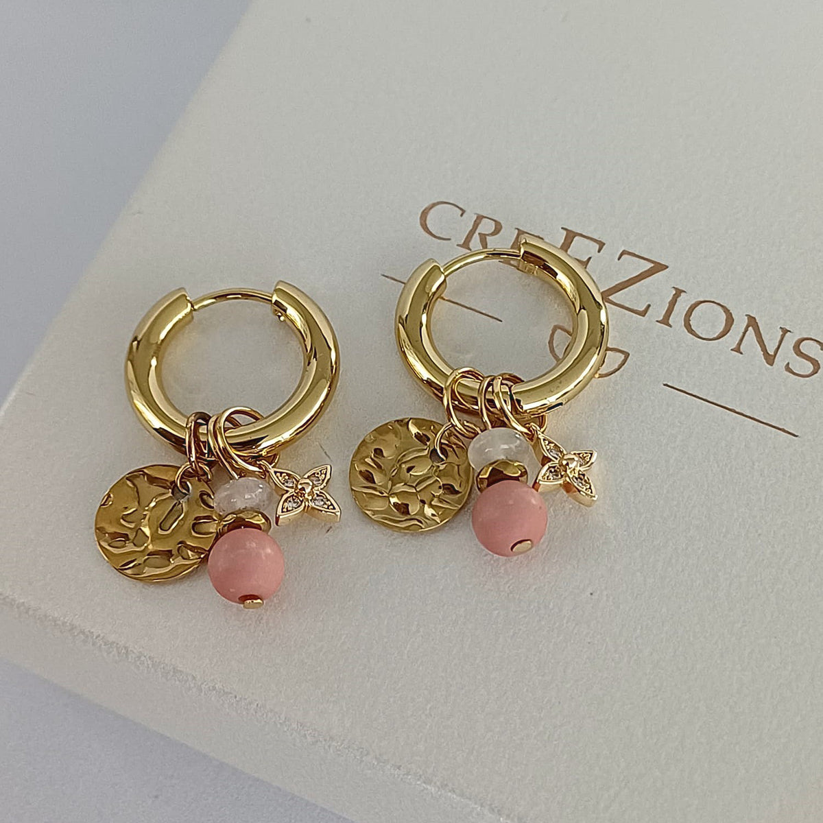 Mix & match oorbellen met roze jade, rozenkwarts en zirkonia bloem