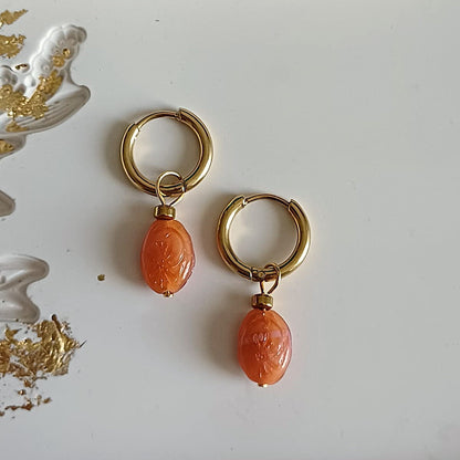 Mix & match bedel met zonnige glaskraal