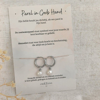 Parel in Gods Hand - Oorbellen met Zoetwaterparel & Hematiet