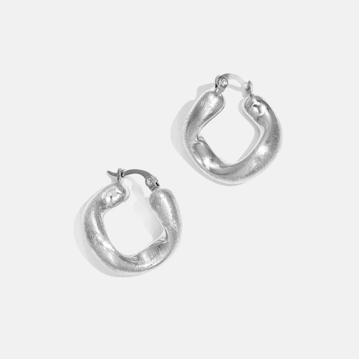 CreEZions oorbellen roestvrij staal gedraaid